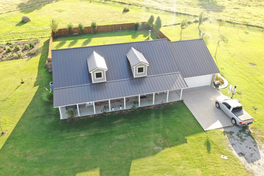 aerial view of a home with new metal roof bartlesville ok